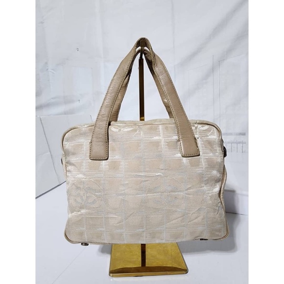 CHANEL Handbags - Authentic Chanel Canvas Leather New Travel Line Shoulder Bag Beige